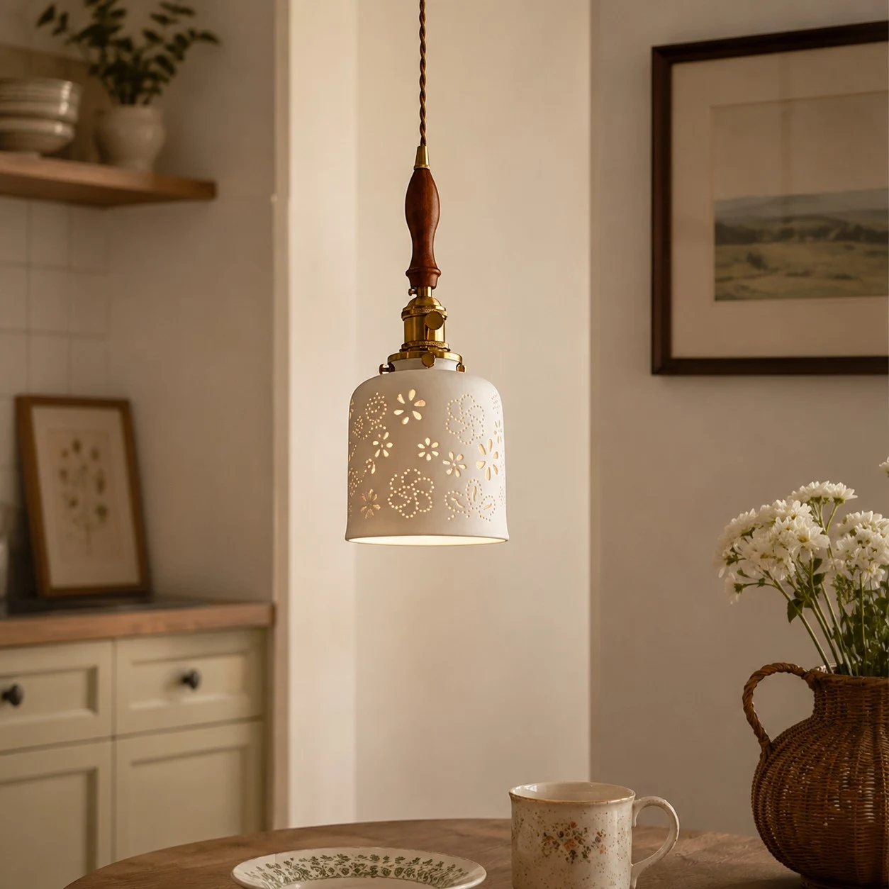 Wood accent floral ceramic pendant light above a table