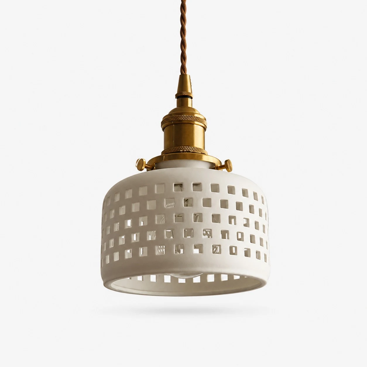 Grid cutout ceramic pendant light with brass hardware