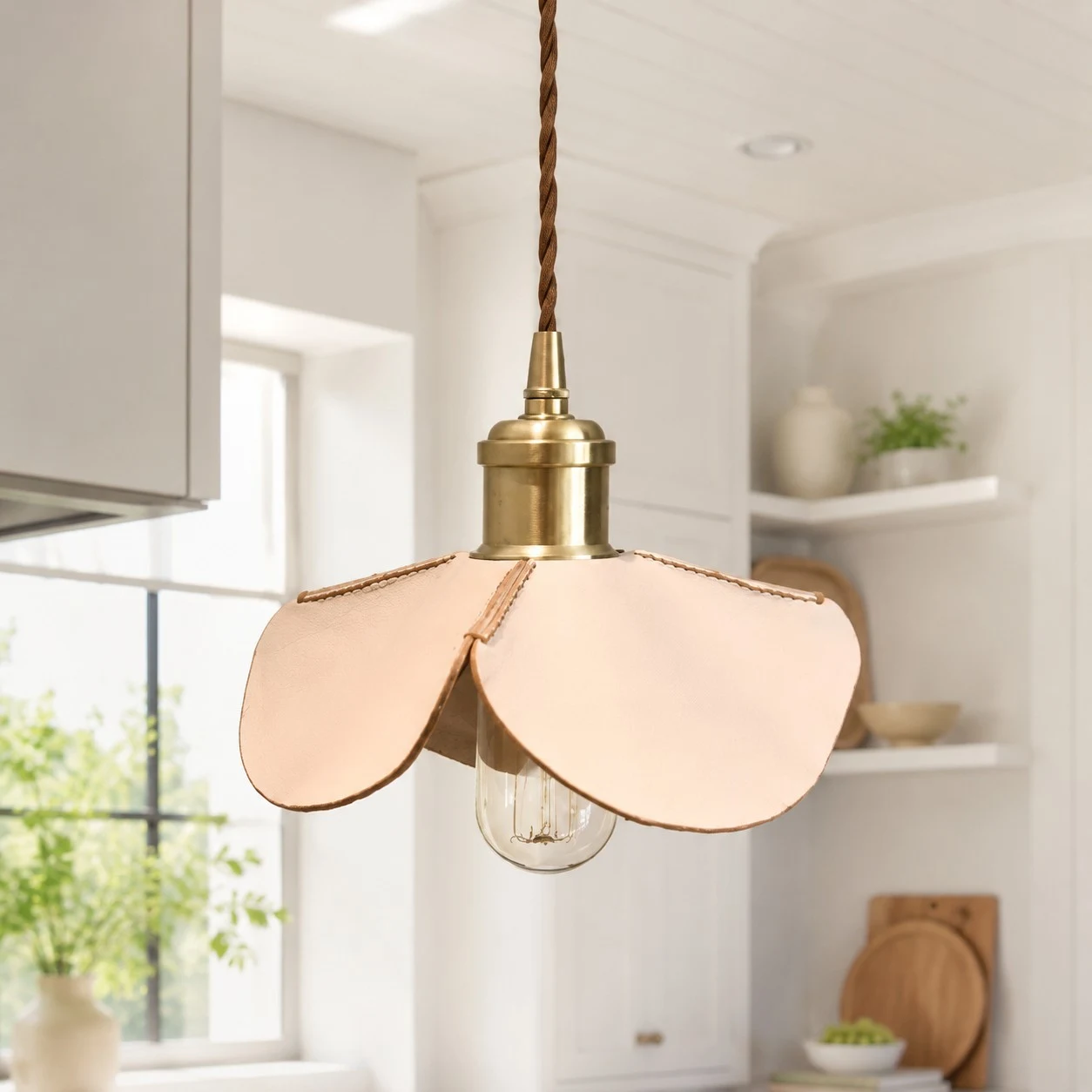 Leather petal pendant light in a bright kitchen corner